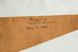 Handwritten 'Harvey + I Grand Coulee Dam May 30, 1939' inscription on vintage leather.