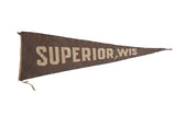 Antique Superior, Wisconsin felt flag pennant in faded brown with beige lettering.
