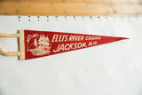 Red felt vintage pennant featuring off-white Ellis River Cabins text and cabin graphic.