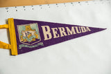 Vintage purple felt Bermuda pennant featuring yellow, blue, and white lion and ship crest.