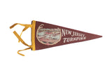 Vintage New Jersey Turnpike felt pennant, brick red with colorful bridge imagery and yellow ties.