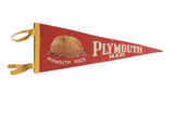 Red 1950s felt Plymouth Mass. pennant featuring Plymouth Rock 1620 graphic and yellow ties.
