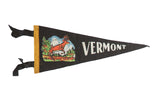 Vintage Vermont felt flag pennant, black with colorful deer imagery and white VERMONT lettering.
