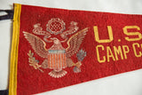 Vintage felt pennant: time-softened red, U.S. Army crest, 'E Pluribus Unum,' yellow 'U.S. CAMP'.