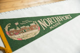 Green felt vintage Northport Maine pennant showing Atlantic Tropical Nut House graphic detail.