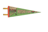Vintage Hershey Farm felt flag pennant in bright green, depicting a farm scene and Barney the Buffalo, 5x14 inches.