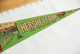 Vintage Hershey Farm felt pennant, showing green text, Lancaster County details and farm illustration.