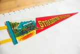 Vintage Strasburg Rail Road felt pennant showing green train, horse, and red text.