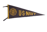 Vintage dark blue felt U.S. Navy pennant with golden yellow text, circular emblem, and yellow trim, 8
