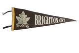 Vintage Brighton, Ont. felt pennant, dark grey with a light maple leaf and white text.