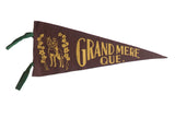 Vintage brown felt pennant from Grand Mere, Quebec with a yellow graphic of a man on horseback.