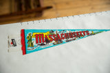 Vintage Massachusetts felt pennant's wide end, showing souvenir tag and red binding.