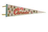 Vintage Canada felt pennant, red 'Canada' script, maple leaf, provincial shields, 8x25 inches.