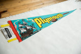 Angled view of the Mayflower ship illustration on the vintage Plymouth felt flag.