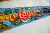 Vintage Story Land Glen New Hampshire felt pennant detail showing red text and characters.