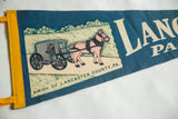 Vintage Lancaster PA felt pennant featuring Amish buggy art, textured blue felt, and yellow trim.