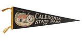 Vintage black felt Caledonia State Park pennant, white Thaddeus Stevens Blacksmith Shop art.
