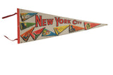 Vintage 1970s New York City felt pennant with red lettering and colorful landmark buildings, 11 x 28 inches.