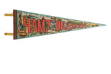 Vintage 1970s Hampton Beach N.H. felt souvenir pennant with red lettering and beach scene.