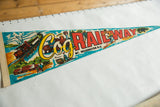 Red 'RAILWAY' text and skier graphic on vintage Mt. Washington felt pennant.