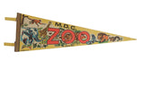 Vintage 1970s MDC Zoo yellow felt pennant with colorful wild animal illustrations, 8x25 inches.