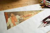 Graceland Memphis felt pennant featuring Elvis Presley, with time-softened colors and evident creases.