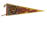 Vintage yellow felt Lion Country Safari pennant, featuring a lion's head, zebra stripes, and red lettering. 9x26 inches.
