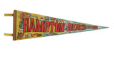 Vintage 1970s Hampton Beach NH felt pennant with vibrant yellow and red beach imagery.