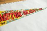 Red and yellow Hampton Beach N.H. lettering on vintage felt pennant with beach scene.