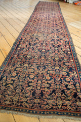 Traditional Persian Malayer runner, allover Herati motif in navy, red, and sand.