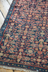 Vintage Malayer runner's traditional Herati motif, navy, red, sand, narrow border, fringe.