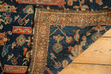 Antique Fereghan rug edge with tattered selvedge, showcasing navy pile and detailed foundation weave.