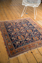 Late 19th century Afshar rug corner, navy and rust floral vinery, borders, and tattered ends.
