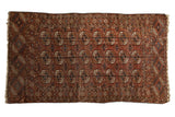 Antique Tekke rug, circa 1880s, with repeating elephant footprint gul motifs in dusty brick red, 3'9