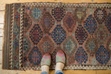 Late 19th century hand-knotted Belouch runner's geometric gul motifs and patterned side border.