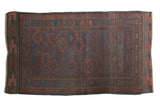 Antique Belouch rug with allover repeating medallion design in indigo, madder red, charcoal, 3'8