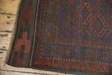 Antique Belouch rug kilim end, featuring madder red geometric patterns and secure blue side.