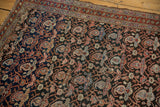 Intricate allover boteh motif and vinery, charcoal, blush, cherry red, showing mostly even pile wear.