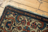 Antique Borchalou rug corner: rare ivory field, dramatic scrolling motifs, and visible tatter.