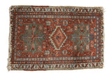 Brick red Vintage Karaja rug, geometric medallion, mallard green, sky blue. 2'4