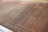 Antique Malayer carpet, allover boteh design, raspberry, charcoal, and visible foundation etching.