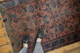 Vintage Persian Lilihan rug's dusty rose field, allover Herati pattern, with even wear and abrash.