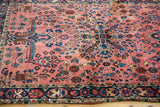 Vintage Mohajeran Sarouk rug border and floral field in dusty raspberry, teal, and patina.