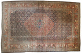 Antique Persian Farahan Sarouk rug, dramatic scalloped terra cotta medallion, dense navy field, 11'2