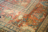 Detail of antique Farahan Sarouk corner, terra cotta field with palmette motifs, and low pile texture.