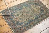 Antique Haji Jalili Tabriz rug corner with dusty teal, pale rose border, and visible fringed tatter.