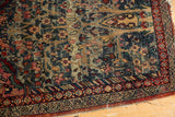 Abrash striations on vintage Kerman rug, slate blue floral pattern, tattered red border.