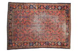 Vintage Lilihan rug, madder root red field, floating Herati motif, deep navy borders, 5' x 6'10