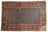 Vintage Northwest Persian rug, navy boteh field, cherry red floral medallion borders. 4'2