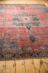 Antique Farahan Sarouk border with patterned floral cross sections, raspberry field, delicate tendrils.